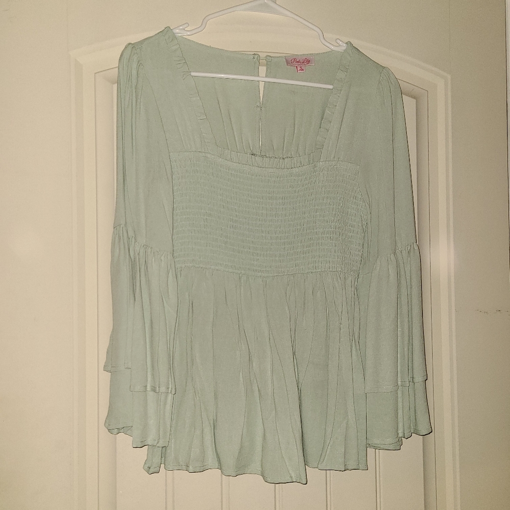 Pink Lily smocked bell sleeve top